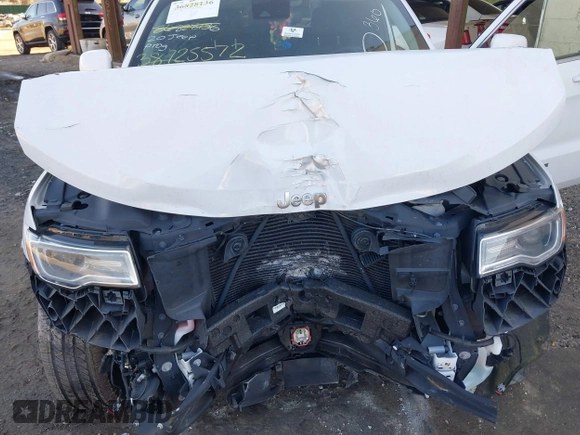 2020 Jeep Grand Cherokee Summit with VIN 1C4RJFJT0LC163752, listed as a IAAI auction lot 38725572 with 49,652 mi miles and . Bid and sale history available at DreamBid. Image 10.