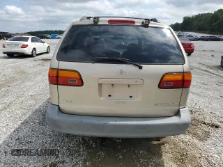 2000 Toyota Sienna LE z VIN 4T3ZF13C7YU259075, wystawiony jako Copart lot #58416105 z przebiegiem 235 788 mil mil oraz Szkoda całkowita • Salvage title. Historia ofert i sprzedaży dostępna na DreamBid. Obrazek 6.