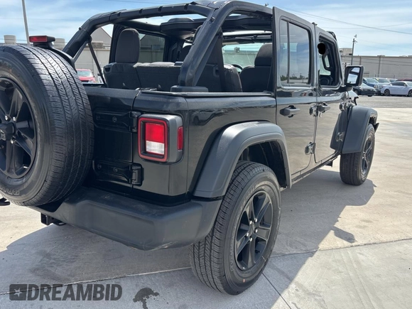 2023 Jeep Wrangler Sport S with VIN 1C4HJXDG2PW615754, listed as a Copart auction lot 53884255 with 34,427 mi miles and Clean Title. Bid and sale history available at DreamBid. Image 4.