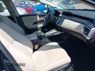 2018 Honda Clarity Touring z VIN JHMZC5F32JC001730, wystawiony jako IAAI lot #41718456 z przebiegiem 64 619 mil mil oraz . Historia ofert i sprzedaży dostępna na DreamBid. Obrazek 5.