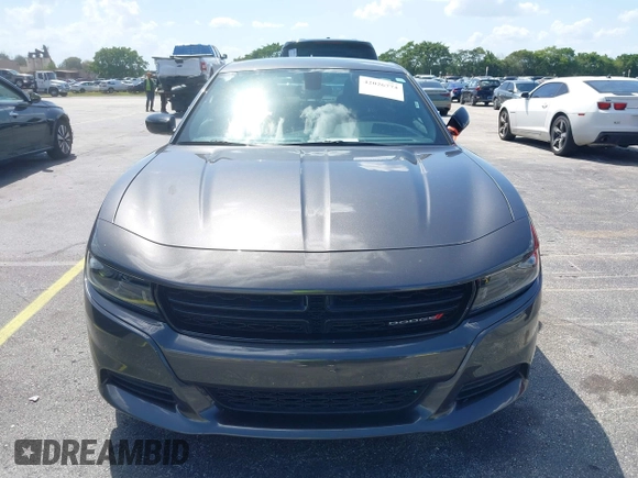 2023 Dodge Charger SXT with VIN 2C3CDXBG0PH571518, listed as a IAAI auction lot 42026774 with 47,394 mi miles and . Bid and sale history available at DreamBid. Image 12.