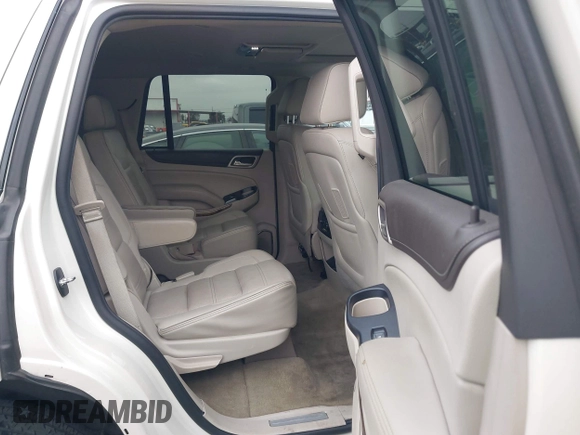 2015 GMC Yukon Denali with VIN 1GKS2CKJ9FR294551, listed as a IAAI auction lot 42162654 with 106,063 mi miles. Bid and sale history available at carsss.com. Image 8.