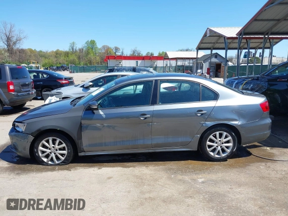 2011 Volkswagen Jetta Sedan SE PZEV with VIN 3VWDZ7AJ0BM306023, listed as a IAAI auction lot 42059241 with 176,879 mi miles. Bid and sale history available at carsss.com. Image 14.