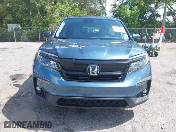 2021 Honda Pilot Special Edition with VIN 5FNYF5H25MB041980, listed as a IAAI auction lot 39597428 with 43,167 mi miles and . Bid and sale history available at carsss.com. Image 12.