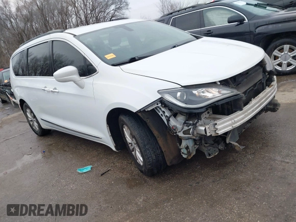 2017 Chrysler Pacifica Touring L with VIN 2C4RC1BG4HR583463, listed as a IAAI auction lot 41487599 with 180,459 mi miles and . Bid and sale history available at DreamBid. Image 1.