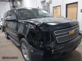 2012 Chevrolet Suburban LTZ with VIN 1GNSKKE77CR326924, listed as a IAAI auction lot 41764487 with 198,224 mi miles. Bid and sale history available at carsss.com. Image 6.