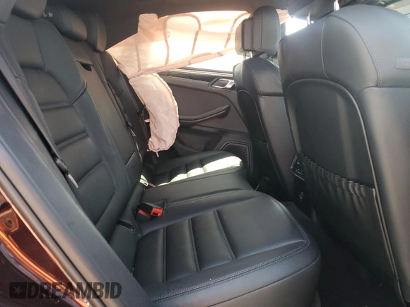 2024 Porsche Macan with VIN WP1AA2A53RLB14849, listed as a Copart auction lot 57979155 with 10,031 mi miles and Salvage title. Bid and sale history available at DreamBid. Image 11.