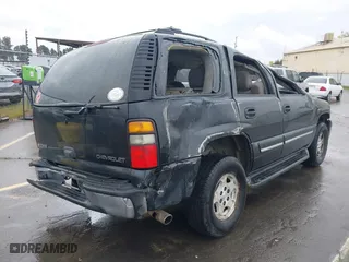 2005 Chevrolet Tahoe Z71 with VIN 1GNEC13T15R205653, listed as a IAAI auction lot 41808672 with 210,261 mi miles. Bid and sale history available at carsss.com. Image 4.