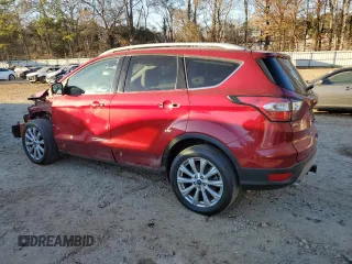 2017 Ford Escape Titanium with VIN 1FMCU0J94HUD34112, listed as a Copart auction lot 85837974 with 127,576 mi miles and Salvage Title. Bid and sale history available at carsss.com. Image 2.