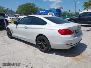 2015 BMW 4 Series 428i xDrive with VIN WBA3N5C58FK198825, listed as a IAAI auction lot 41919172 with 125,421 mi miles. Bid and sale history available at carsss.com. Image 3.