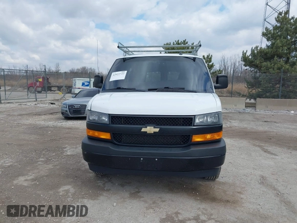 2018 Chevrolet Express Cargo Van with VIN 1GCWGAFP6J1336229, listed as a IAAI auction lot 42022722 with 99,005 mi miles. Bid and sale history available at carsss.com. Image 12.