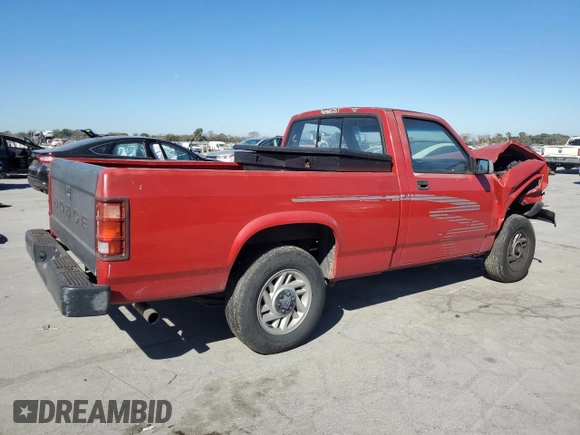 1993 Dodge Dakota S z VIN 1B7FL26X2PS175592, wystawiony jako Copart lot #76744054 z przebiegiem 94 863 mil mil oraz Szkoda całkowita • Salvage title. Historia ofert i sprzedaży dostępna na DreamBid. Obrazek 3.