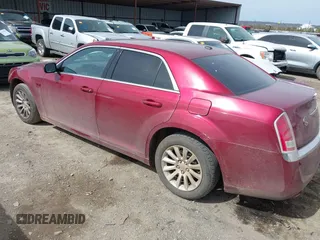 2013 Chrysler 300 with VIN 2C3CCAAG3DH658472, listed as a IAAI auction lot 41725689 with 103,541 mi miles. Bid and sale history available at carsss.com. Image 3.