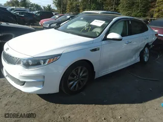 2017 Kia Optima EX with VIN 5XXGU4L32HG156941, listed as a IAAI auction lot 40299001 with 128,592 mi miles. Bid and sale history available at carsss.com. Image 2.
