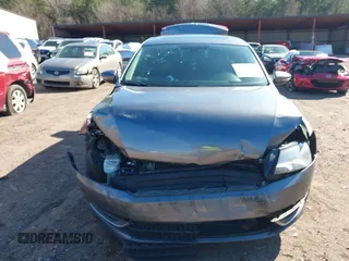 2012 Volkswagen Passat SE with VIN 1VWBH7A36CC027321, listed as a IAAI auction lot 41596709 with 173,357 mi miles and . Bid and sale history available at DreamBid. Image 6.