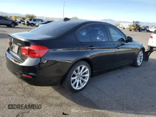 2018 BMW 3 Series 320i with VIN WBA8A9C51JAD27692, listed as a Copart auction lot 80269094 with 67,429 mi miles and Salvage Title. Bid and sale history available at carsss.com. Image 3.