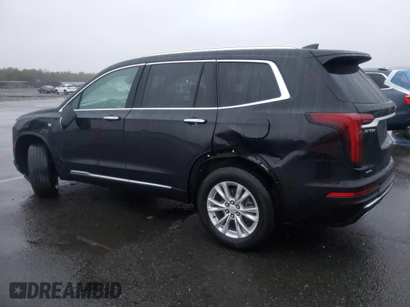 2023 Cadillac XT6 AWD Luxury z VIN 1GYKPBR41PZ110836, wystawiony jako Copart lot #84441314 z przebiegiem 77 023 mil mil oraz Szkoda całkowita • Salvage title. Historia ofert i sprzedaży dostępna na DreamBid. Obrazek 2.