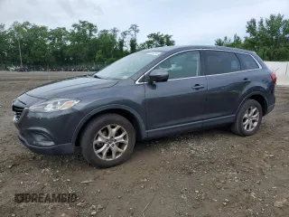 2015 Mazda CX-9 Touring with VIN JM3TB2CA2F0452202, listed as a Copart auction lot 60407215 with 158,373 mi miles and Salvage title. Bid and sale history available at DreamBid. Image 1.