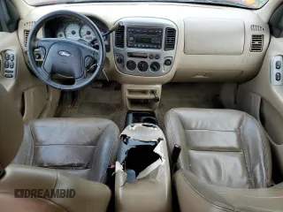2003 Ford Escape XLT Popular 2 with VIN 1FMYU93183KB78114, listed as a Copart auction lot 73991704 with 316,574 mi miles and Salvage Title. Bid and sale history available at carsss.com. Image 8.