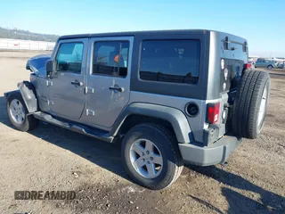 2018 Jeep Wrangler JK Unlimited Sport S with VIN 1C4BJWDG5JL926703, listed as a IAAI auction lot 41382629 with 66,567 mi miles. Bid and sale history available at carsss.com. Image 3.