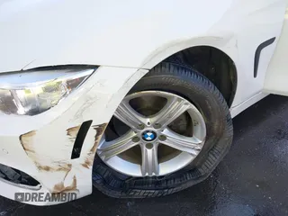 2014 BMW 4 Series 428i with VIN WBA3N7C50EF718812, listed as a IAAI auction lot 41349128 with 67,581 mi miles and . Bid and sale history available at carsss.com. Image 6.