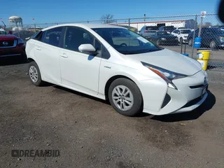 2016 Toyota Prius Two z VIN JTDKBRFU4G3512080, wystawiony jako IAAI lot #41856196 z przebiegiem 119 034 mil mil oraz . Historia ofert i sprzedaży dostępna na DreamBid. Obrazek 1.