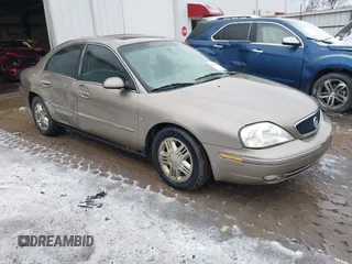 2003 Mercury Sable LS Premium z VIN 1MEHM55SX3A614274, wystawiony jako IAAI lot #41564448 z przebiegiem 245 449 mil mil oraz . Historia ofert i sprzedaży dostępna na DreamBid. Obrazek 1.