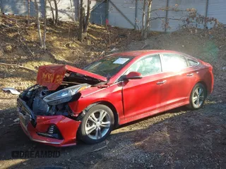 2018 Hyundai Sonata SEL with VIN 5NPE34AF2JH631831, listed as a IAAI auction lot 41754599 with 61,632 mi miles and . Bid and sale history available at DreamBid. Image 2.