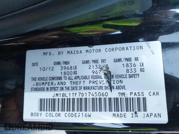 2013 Mazda 3 i SV with VIN JM1BL1TF7D1745060, listed as a IAAI auction lot 41985303 with 132,625 mi miles. Bid and sale history available at carsss.com. Image 9.