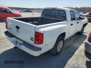 2007 Dodge Dakota SLT z VIN 1D7HE48P77S164721, wystawiony jako Copart lot #49673685 z przebiegiem 218 861 mil mil oraz Szkody całkowita. Historia ofert i sprzedaży dostępna na DreamBid. Obrazek 3.
