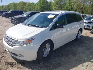 2013 Honda Odyssey Touring with VIN 5FNRL5H96DB009694, listed as a IAAI auction lot 42002487 with 182,867 mi miles and . Bid and sale history available at carsss.com. Image 17.