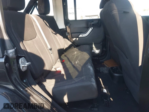 2018 Jeep Wrangler JK Unlimited Sahara with VIN 1C4HJWEG8JL921293, listed as a IAAI auction lot 41413264 with 90,566 mi miles. Bid and sale history available at carsss.com. Image 8.