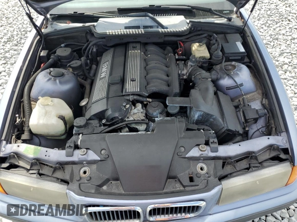 1997 BMW 3-Series 328IC with VIN WBABK832XVET96413, listed as a Copart auction lot 47806025 with 66,051 mi miles and Salvage Title. Bid and sale history available at carsss.com. Image 11.
