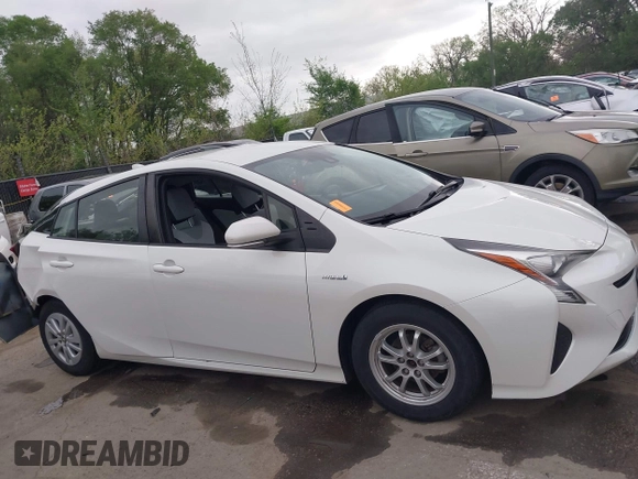 2017 Toyota Prius Two with VIN JTDKBRFUXH3036063, listed as a IAAI auction lot 42036676 with 202,873 mi miles. Bid and sale history available at carsss.com. Image 13.