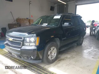 2007 Chevrolet Tahoe LT with VIN 1GNFC13037J129669, listed as a IAAI auction lot 42421808 with 268,523 mi miles and . Bid and sale history available at DreamBid. Image 2.