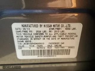 2014 Infiniti Q50 Premium with VIN JN1BV7ARXEM695610, listed as a Copart auction lot 68027764 with 144,392 mi miles and Non Repairable. Bid and sale history available at carsss.com. Image 12.
