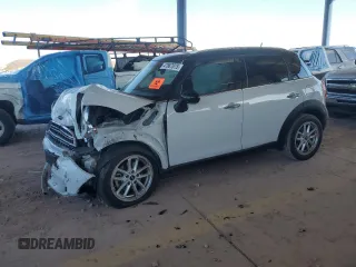 2015 MINI Countryman with VIN WMWZB3C50FWR45253, listed as a Copart auction lot 63608655 with 123,701 mi miles and Salvage title. Bid and sale history available at DreamBid. Image 1.