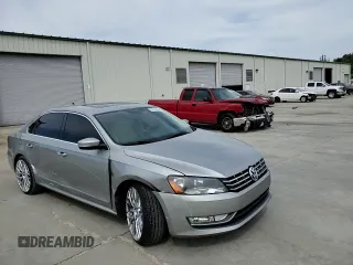 2014 Volkswagen Passat SEL Premium z VIN 1VWCN7A35EC073576, wystawiony jako Copart lot #52810825 z przebiegiem 113 067 mil mil oraz Szkoda całkowita • Salvage title. Historia ofert i sprzedaży dostępna na DreamBid. Obrazek 11.