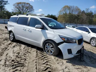 2016 Kia Sedona LX with VIN KNDMB5C17G6163863, listed as a Copart auction lot 52128745 with 165,416 mi miles and Salvage Title. Bid and sale history available at DreamBid. Image 4.