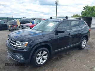 2018 Volkswagen Atlas SEL z VIN 1V2MR2CA2JC516351, wystawiony jako IAAI lot #42341113 z przebiegiem 135 077 mil mil oraz . Historia ofert i sprzedaży dostępna na DreamBid. Obrazek 2.