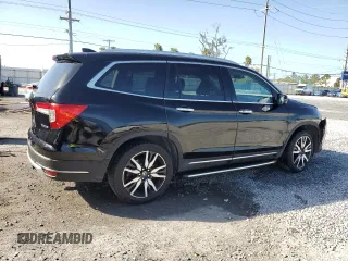 2019 Honda Pilot Touring 8-Passenger z VIN 5FNYF5H97KB007291, wystawiony jako Copart lot #47608765 z przebiegiem 70 758 mil mil oraz Szkoda całkowita • Salvage title. Historia ofert i sprzedaży dostępna na DreamBid. Obrazek 3.