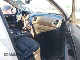 2012 Jeep Grand Cherokee Laredo with VIN 1C4RJFAG5CC310893, listed as a IAAI auction lot 41695279 with 136,821 mi miles. Bid and sale history available at carsss.com. Image 5.