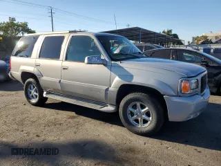 2000 GMC Denali z VIN 1GKEK63R8YR212220, wystawiony jako Copart lot #77606364 z przebiegiem 337 467 mil mil oraz Tytuł czysty. Historia ofert i sprzedaży dostępna na DreamBid. Obrazek 4.