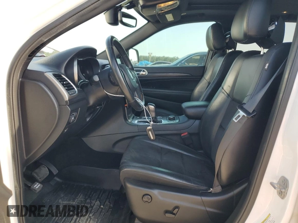 2020 Jeep Grand Cherokee Laredo E with VIN 1C4RJFAG4LC225205, listed as a Copart auction lot 55650525 with 93,459 mi miles and Salvage title. Bid and sale history available at DreamBid. Image 7.