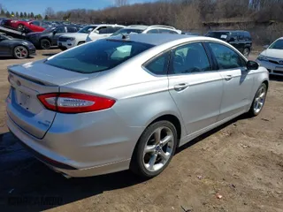 2013 Ford Fusion SE Hybrid with VIN 3FA6P0LUXDR182208, listed as a IAAI auction lot 41885221 with 111,242 mi miles. Bid and sale history available at carsss.com. Image 4.
