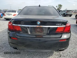 2014 BMW 7 Series 740Li with VIN WBAYE4C52ED138770, listed as a Copart auction lot 53647665 with 106,827 mi miles and Salvage title. Bid and sale history available at DreamBid. Image 6.