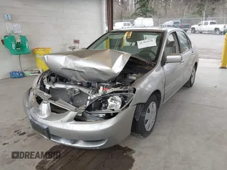 2005 Mitsubishi Lancer ES with VIN JA3AJ26E65U017027, listed as a IAAI auction lot 41765578 with 58,698 mi miles. Bid and sale history available at carsss.com. Image 2.