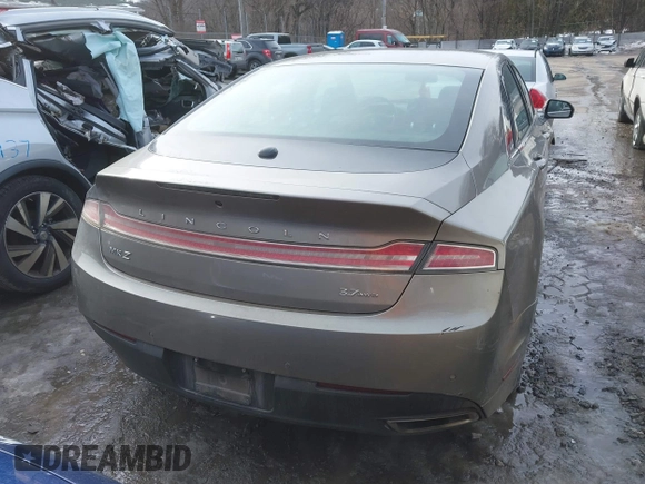 2015 Lincoln MKZ z VIN 3LN6L2JK4FR610596, wystawiony jako IAAI lot #41443285 z przebiegiem 114 363 mil mil oraz . Historia ofert i sprzedaży dostępna na DreamBid. Obrazek 16.