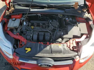 2013 Ford Focus SE z VIN 1FADP3F25DL106381, wystawiony jako Copart lot #74946704 z przebiegiem 169 620 mil mil oraz Szkoda całkowita • Salvage title. Historia ofert i sprzedaży dostępna na DreamBid. Obrazek 11.