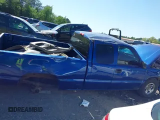 2003 GMC Sierra 1500 SLE z VIN 2GTEC19T131361262, wystawiony jako IAAI lot #41994769 z przebiegiem Nie podano mil oraz . Historia ofert i sprzedaży dostępna na DreamBid. Obrazek 12.